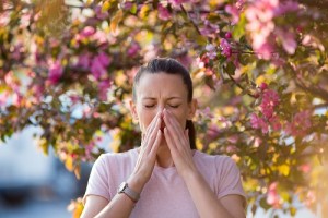 Woman Sneezing in Spring Time