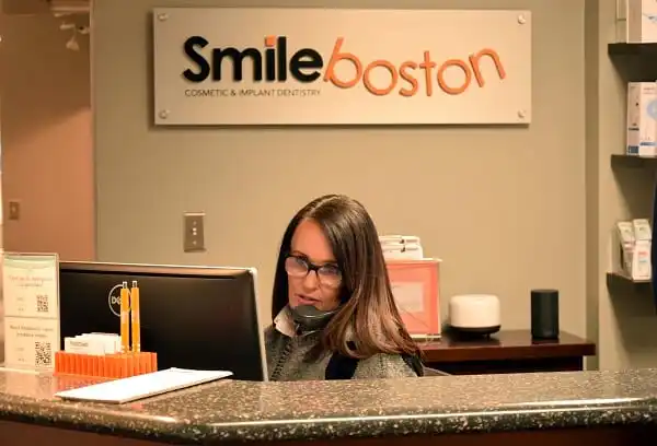 {PRACTICE_NAME} front desk with receptionist